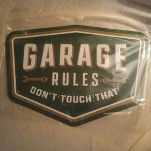 Metal garage rules don’t touch that sign